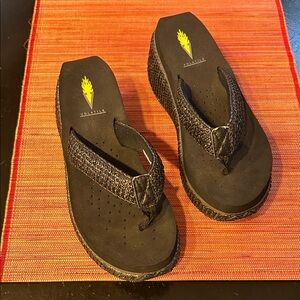 Volatile Black Woven Flip-Flop Wedges